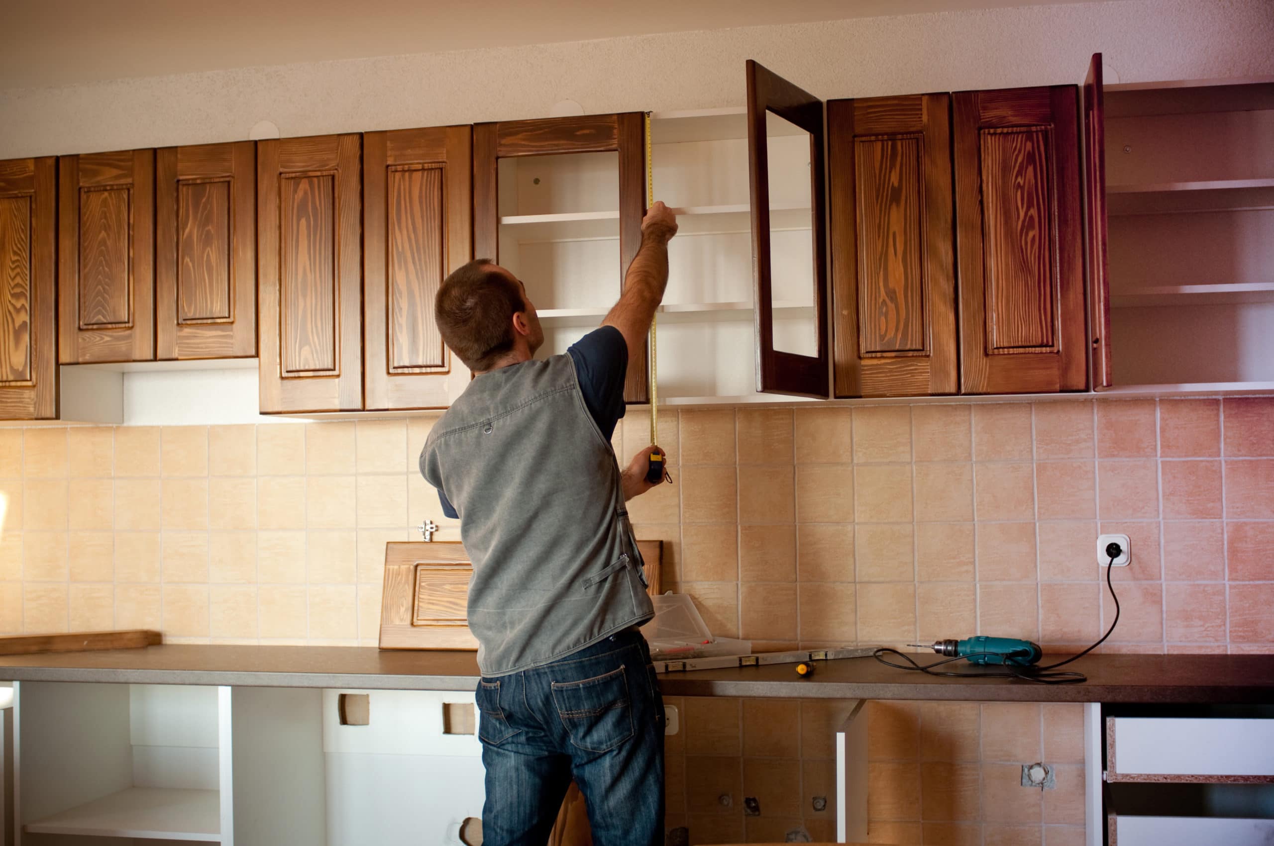 Working on kitchen cabinets